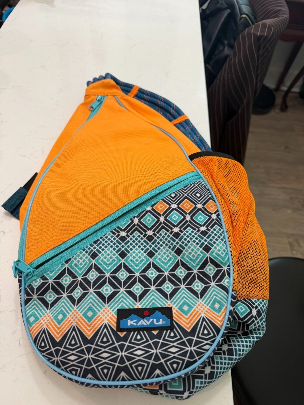 KAVU Rope Sling Bag Orange Teal Geometric Print Crossbody Backpack